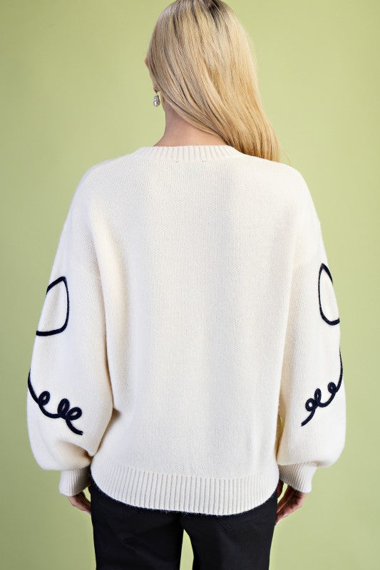 Ivory and Black Bow Motif Sweater